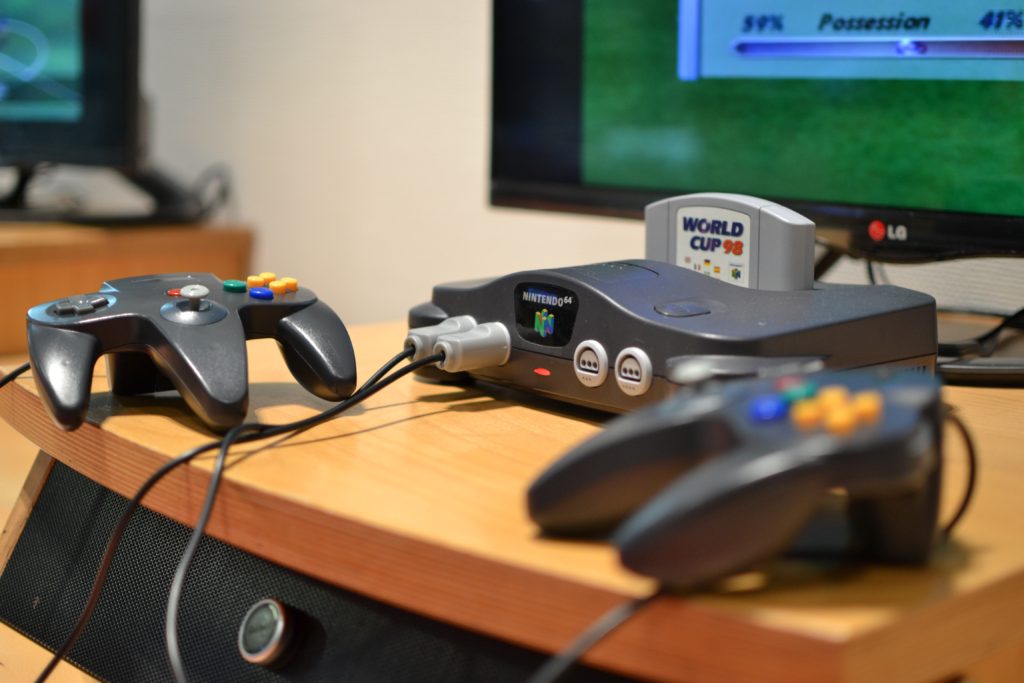 Nintendo 64 with World Cup 98 plugged in and two controllers plugged in.